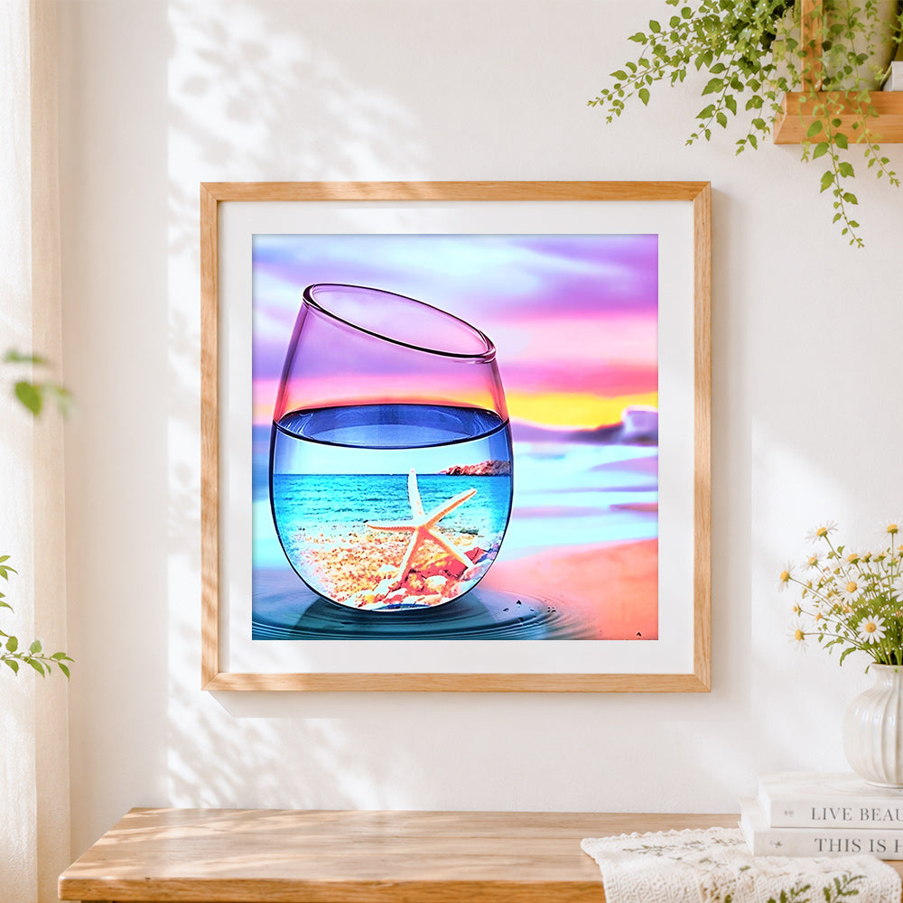 Finished starfish and sunset in a wine glass paint by numbers artwork displayed as home decor