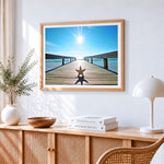 Starfish on sunlit pier paint by numbers artwork displayed on wall as home decor