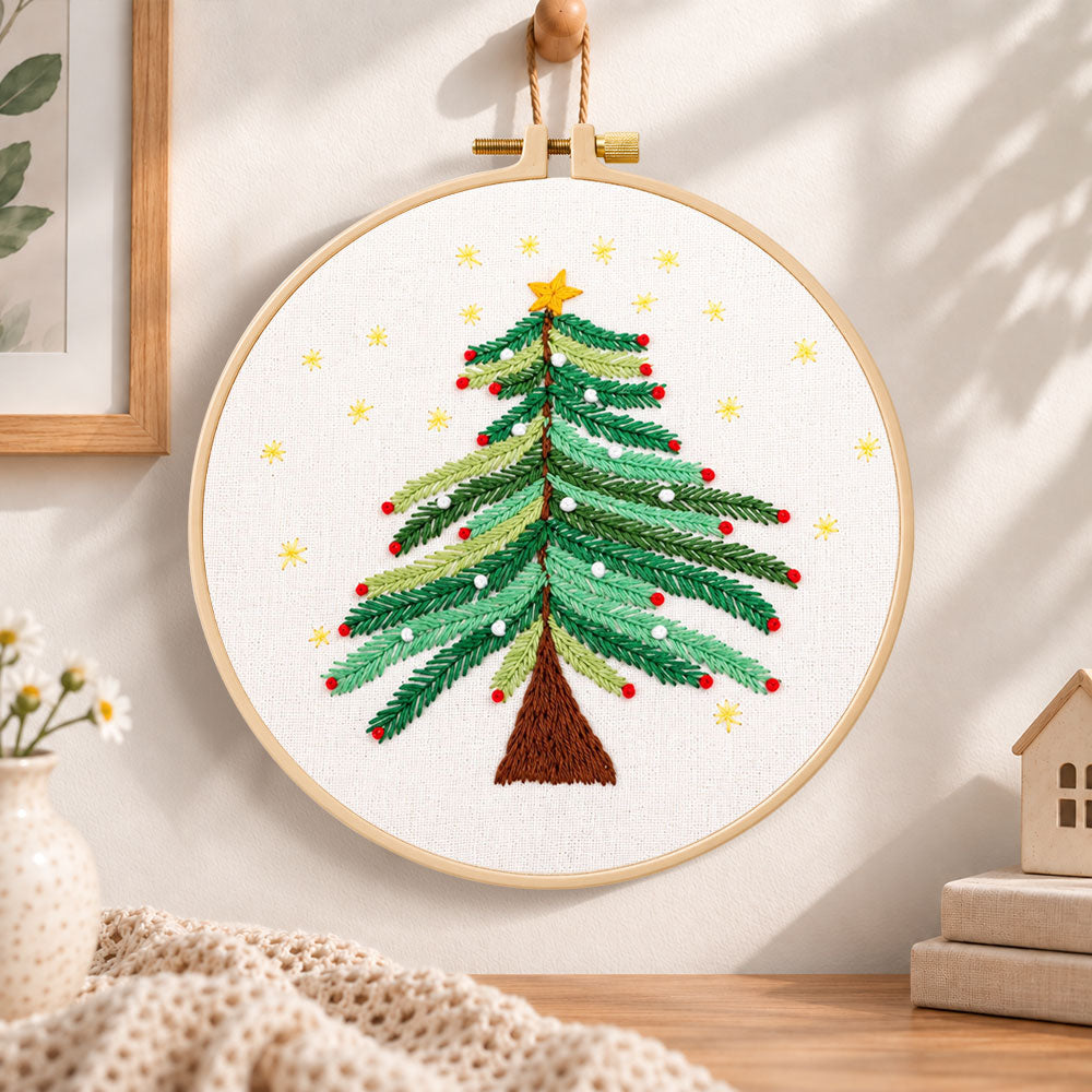 Starry christmas tree with stars embroidery hoop wall art displayed as warm and cosy handmade home decor