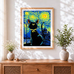 Finished starry night black cat cross stitch artwork displayed