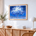 Starry night blossom tree cross stitch artwork displayed on wall as home decor
