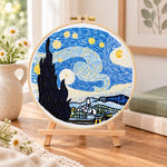 Starry night embroidery scene embroidery kit finished hoop displayed on a wooden stand as cosy tabletop decor
