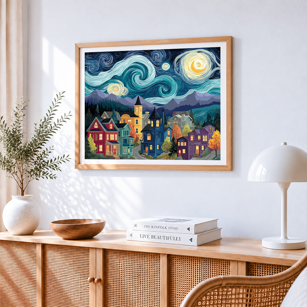 Starry night village cross stitch artwork displayed on wall as home decor