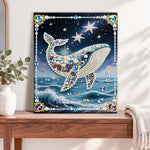Finished starry ocean whale pearl diamond painting artwork displayed as home decor