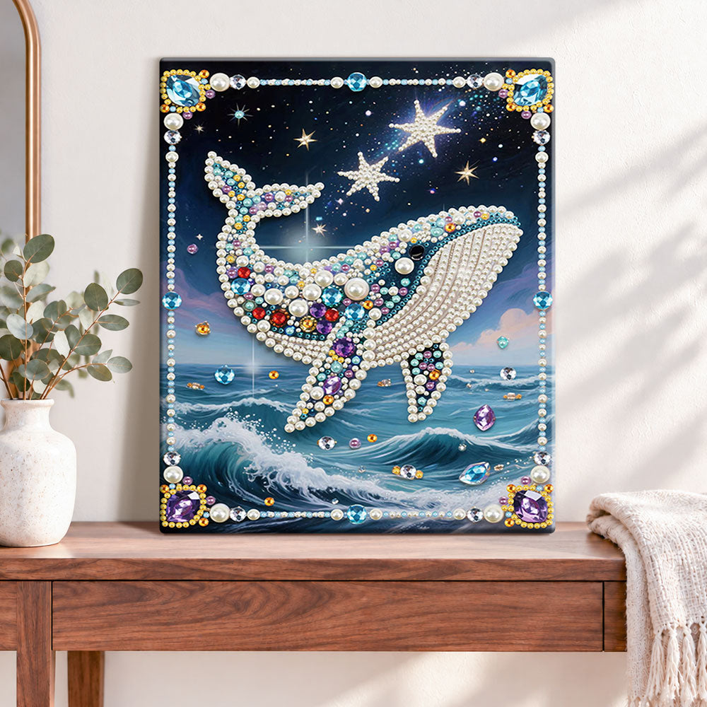 Finished starry ocean whale pearl diamond painting artwork displayed as home decor