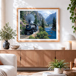 Finished steam train in canyon cross stitch artwork displayed