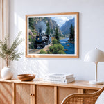 Steam train in canyon cross stitch artwork displayed on wall as home decor