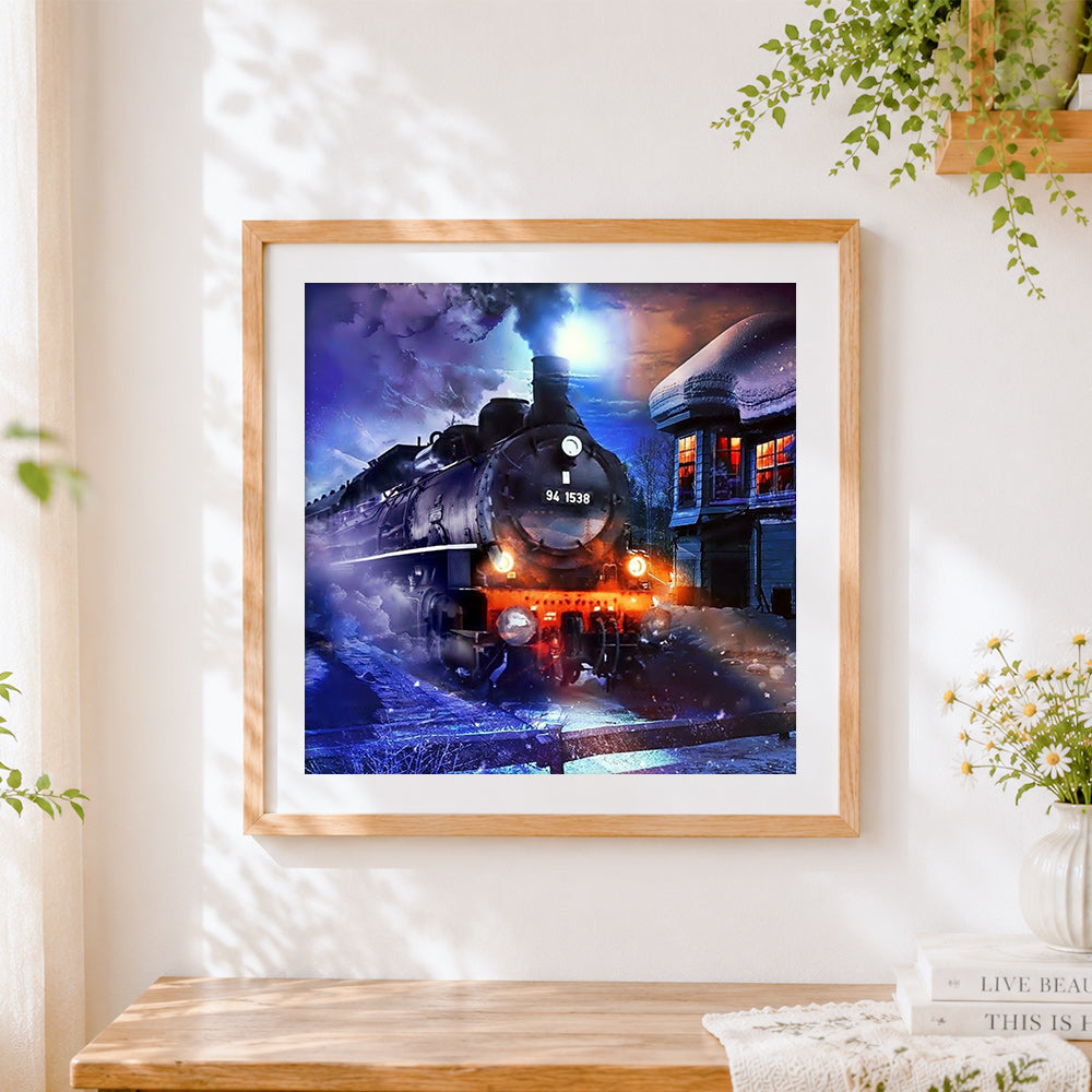 Finished steam train in snowy night cross stitch artwork displayed