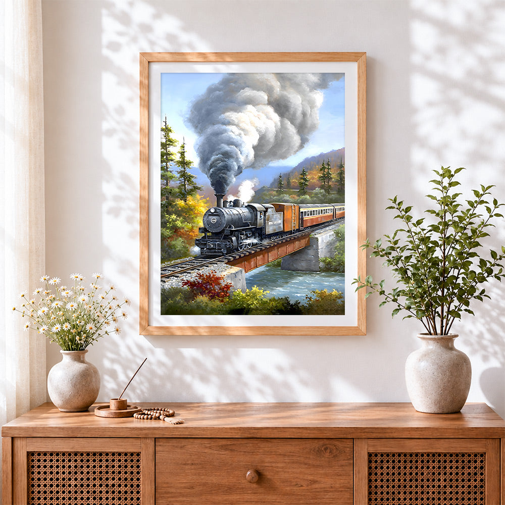 Finished steam train on bridge cross stitch artwork displayed
