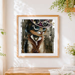 Finished steampunk cat with top hat and goggles cross stitch artwork displayed
