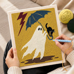 Creating handmade stormy ghost with black cat punch needle artwork