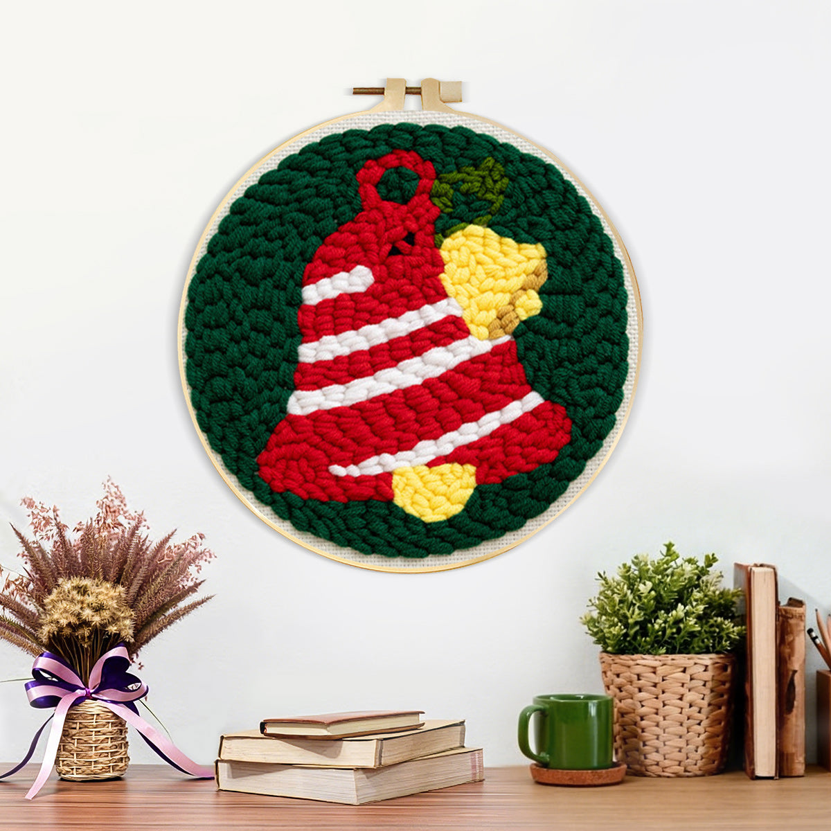 Finished striped christmas bell artwork displayed on a wall