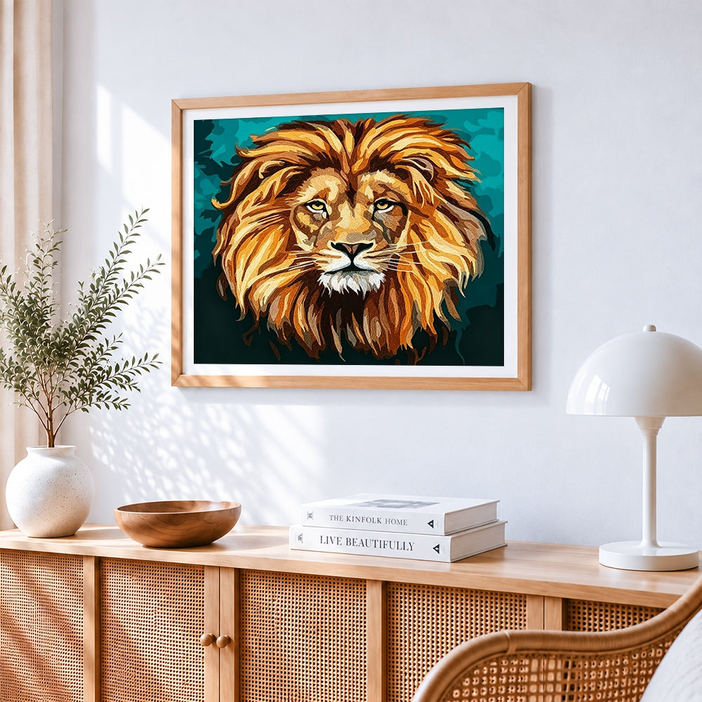 Stylised lion head cross stitch artwork displayed on wall as home decor