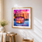 Sun and moon reflection in a wine glass paint by numbers artwork displayed on wall as home decor