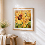 Sunflower close-up cross stitch artwork displayed on wall as home decor