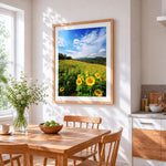Sunflower field and rolling hills cross stitch artwork displayed on wall as home decor
