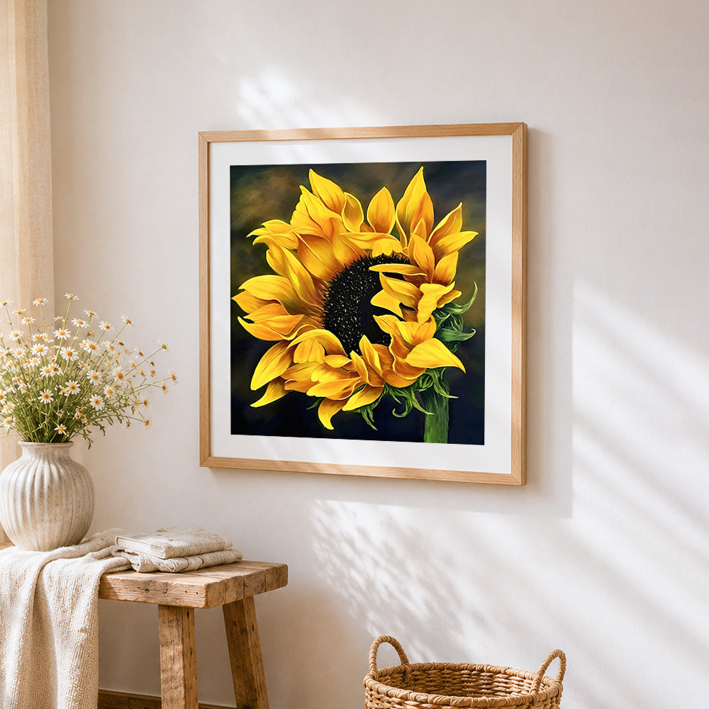 Sunflower on dark background cross stitch artwork displayed on wall as home decor