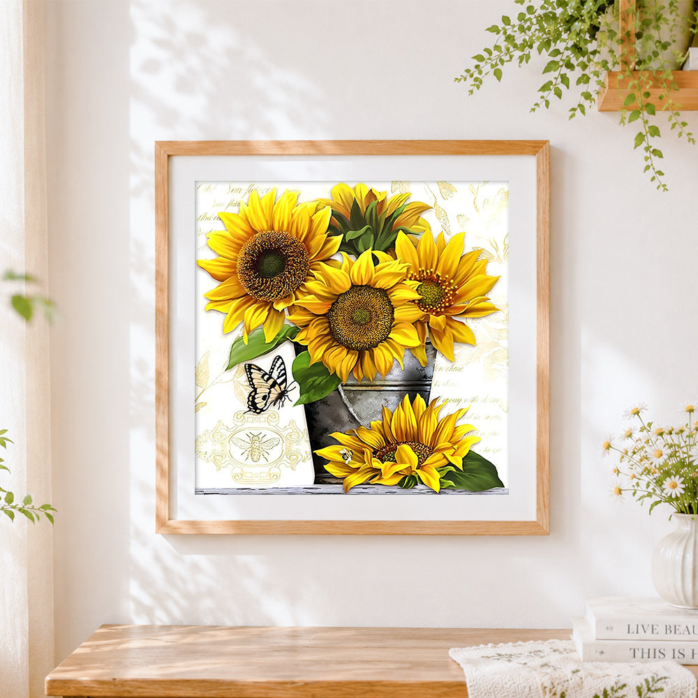 Finished sunflowers and butterfly with vintage text cross stitch artwork displayed