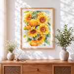 Finished sunflowers and pumpkins cross stitch artwork displayed