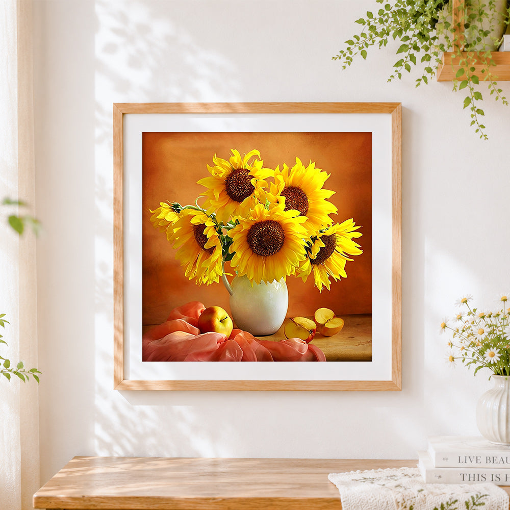 Finished sunflowers in a white jug with apples cross stitch artwork displayed