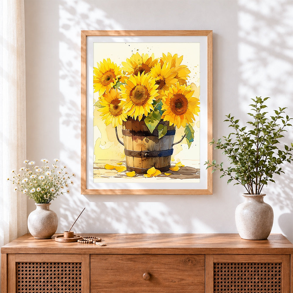Finished sunflowers in a wooden bucket cross stitch artwork displayed