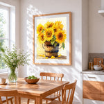 Sunflowers in a wooden bucket cross stitch artwork displayed on wall as home decor