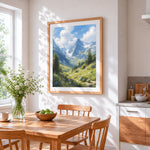 Sunlit alpine valley and wildflowers cross stitch artwork displayed on wall as home decor
