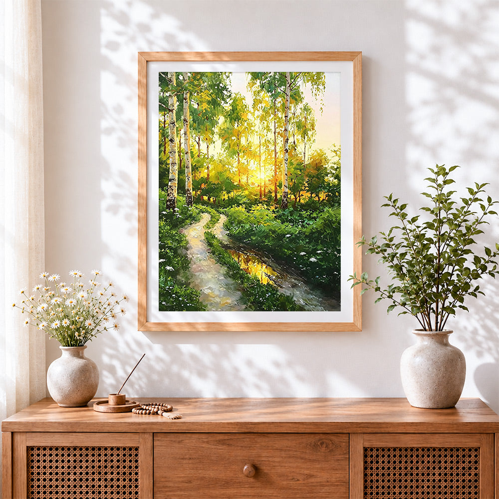 Finished sunlit birch forest path cross stitch artwork displayed