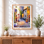 Finished sunlit european cafe street paint by numbers artwork displayed as home decor