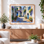 Finished sunlit mediterranean alleyway cross stitch artwork displayed