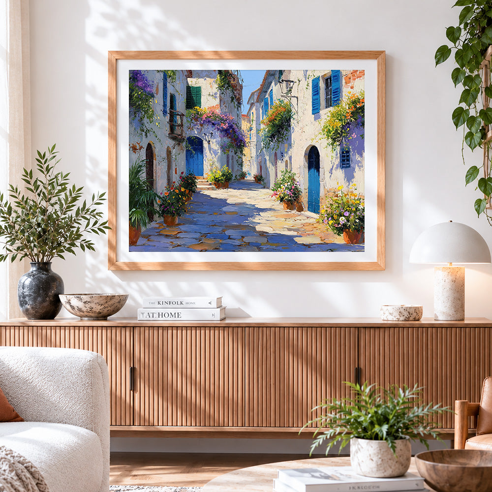 Finished sunlit mediterranean alleyway cross stitch artwork displayed
