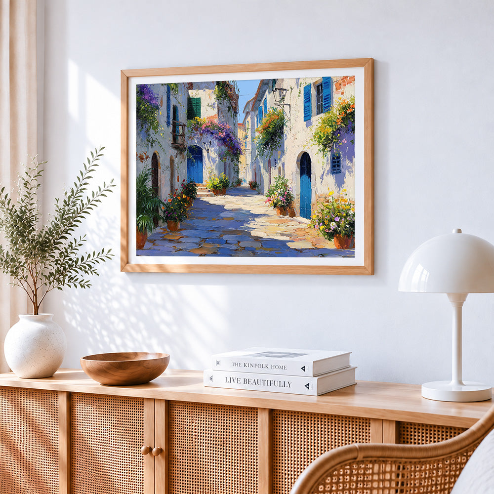 Sunlit mediterranean alleyway cross stitch artwork displayed on wall as home decor