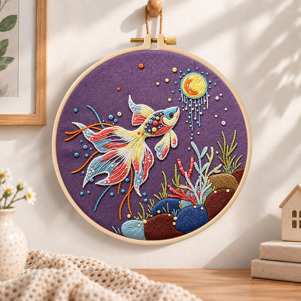 Sunlit underwater koi embroidery hoop wall art displayed as warm and cosy handmade home decor