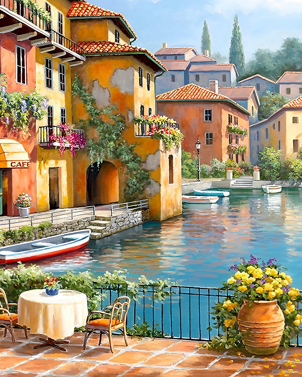Sunlit waterside café with flowers cross stitch kit for beginners