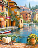 Sunlit waterside café with flowers cross stitch kit for beginners