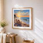 Sunset beach chairs and lighthouse cross stitch artwork displayed on wall as home decor