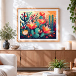 Finished sunset cacti in bloom cross stitch artwork displayed