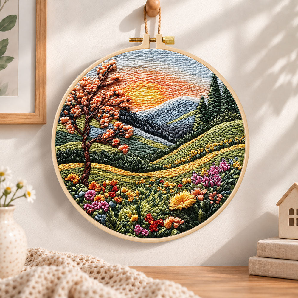 Sunset mountain bloom embroidery hoop wall art displayed as warm and cozy handmade home decor
