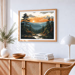 Sunset mountain valley cross stitch artwork displayed on wall as home decor