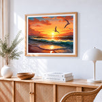 Sunset ocean waves and seagulls cross stitch artwork displayed on wall as home decor