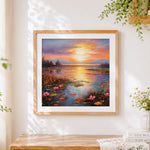 Finished sunset over a lily pond cross stitch artwork displayed