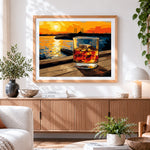Finished sunset whisky glass cross stitch artwork displayed