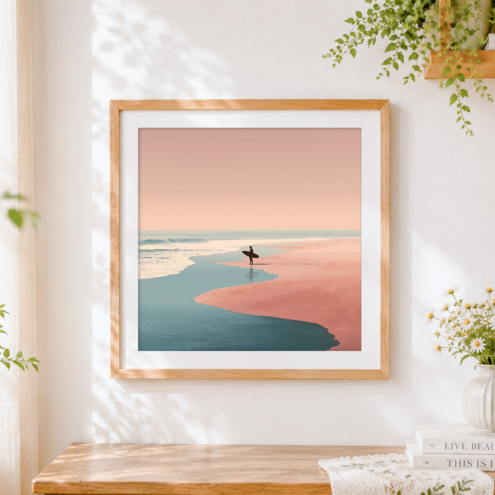 Finished surfer on a pink sand beach cross stitch artwork displayed