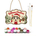 Surprised cat in snow cabin paint by numbers door hanger with paints and brushes