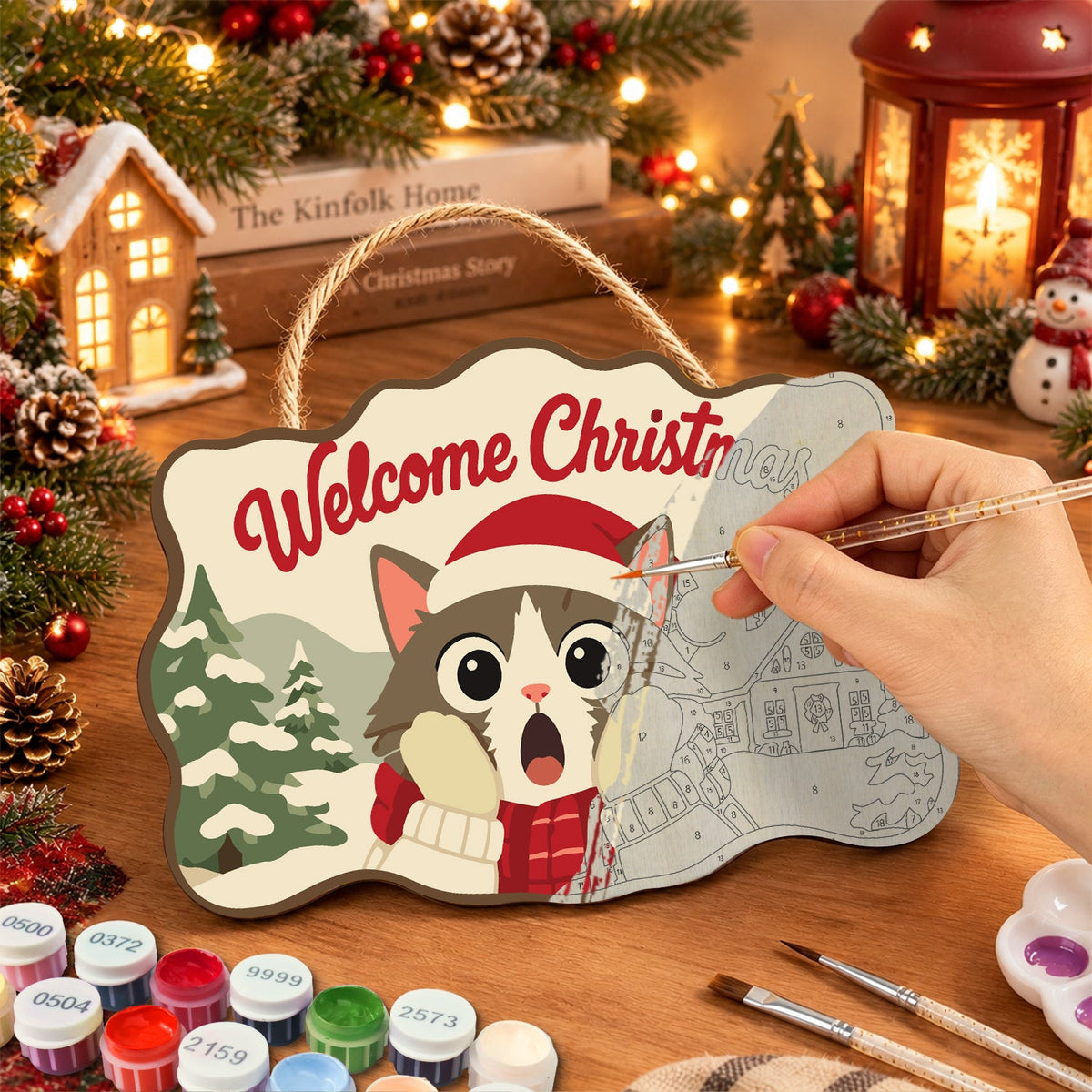 Surprised cat in snow cabin paint by numbers door hanger painting process