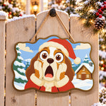 Surprised santa dog paint by numbers door hanger on a garden gate