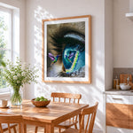 Surreal blue eye and a hummingbird paint by numbers artwork displayed on wall as home decor