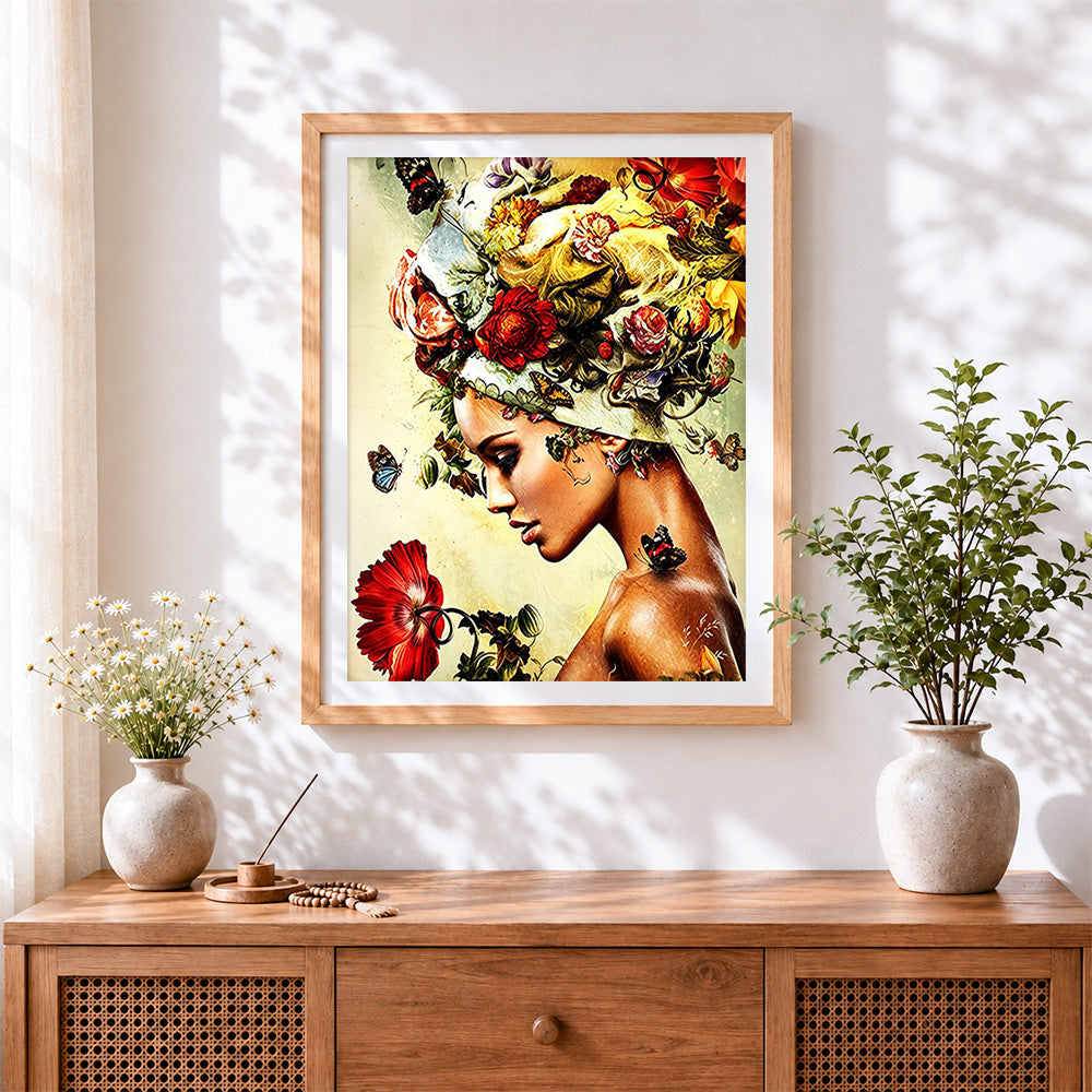 Finished surreal floral woman portrait cross stitch artwork displayed