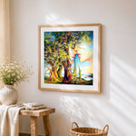 Surreal tree and faces fusion cross stitch artwork displayed on wall as home decor
