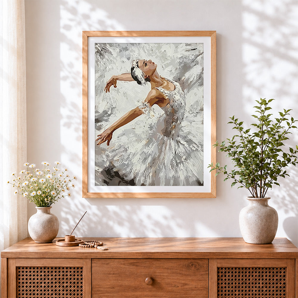 Finished swan lake ballerina portrait cross stitch artwork displayed